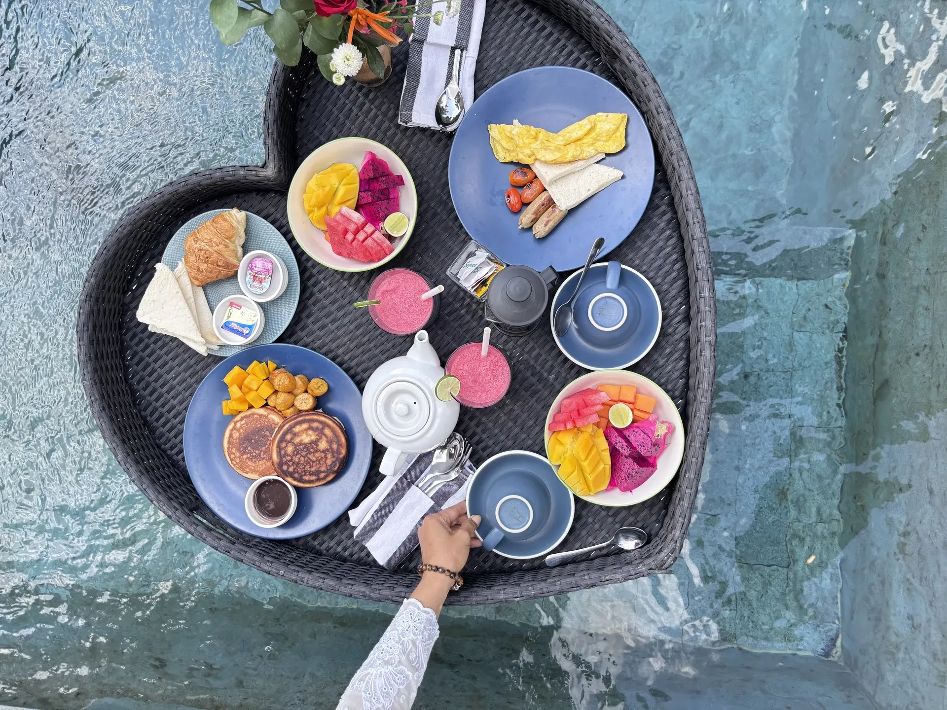 Luxury floating breakfast in private pool at Saughina Ubud