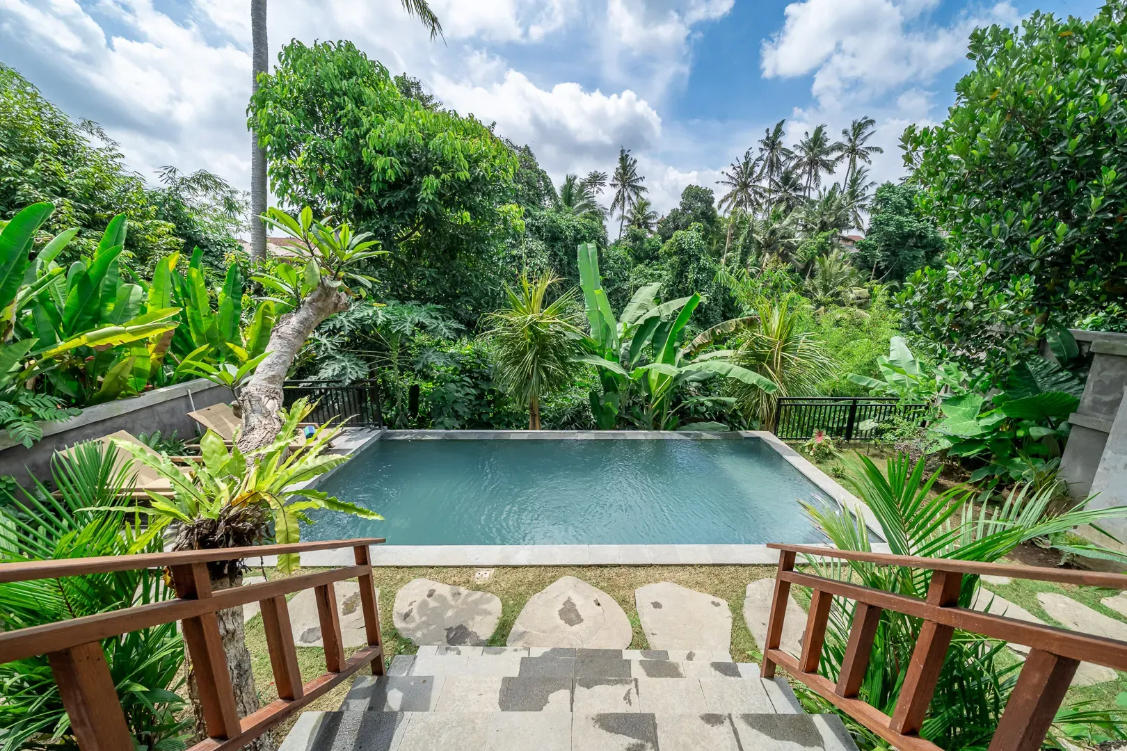 Infinity hanging pool with jungle views at Saughina Ubud villa